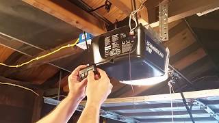 How to Program a Chamberlain Garage Door Remote Control Opener [upl. by Elyk]