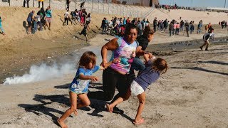 Hundreds of migrants try to storm US border [upl. by Ripley621]