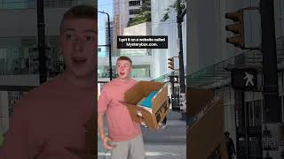 Stranger Stops Pedestrian On The Street With A Mystery Box Shorts [upl. by Akinek656]