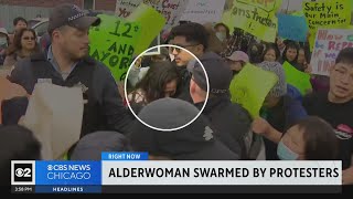 Alderwoman swarmed by protesters upset with migrant tent plan [upl. by Tatia]