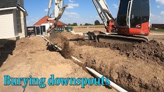 Burying Downspouts On New Construction Home [upl. by Cati]