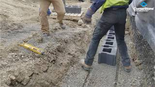 Retaining Wall installation knock off Lug amp Laying first course by Vern Dueck [upl. by Niltiak]