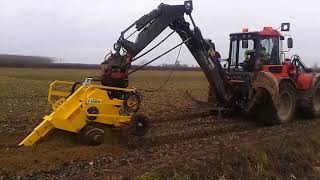 MH100 backhoe mounted hydraulic trencher with soil blades [upl. by Ahseinad816]