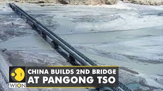 Report China building second bridge in Pangong TSO  China provokes again near border  WION [upl. by Beetner135]