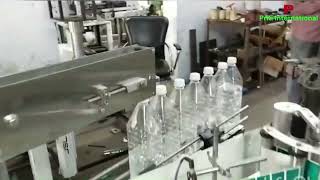 Sticker Labeling Machine for Square Water Bottle  Sticker Labeling Machine  Label Applicator [upl. by Wendall841]