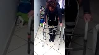 A Paraplegic Woman Is Practicing To Walk Using Walker [upl. by Tyson965]