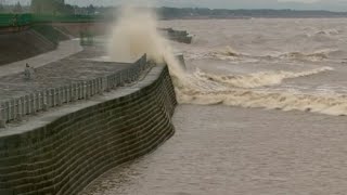 Spectacular Tidal Bores Surge in Qiantang River [upl. by Ase]