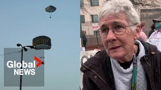 US Gaza food aid airdrop dismissed by protesters “Dropping some food dropping the bombs” [upl. by Shepperd547]