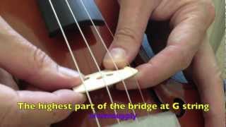 How to set up a violin bridge and tune a violin with a clip violin tuner [upl. by Ellehcem]