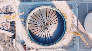 Chinas largest LNG storage tank finishes dome lifting operation [upl. by Ruzich]