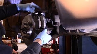 How to replace front brakes and rotors on a Toyota Corolla [upl. by Supen]