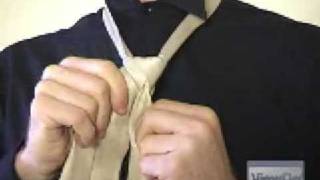 How to tie a double Windsor knot  Wonder How To [upl. by Spratt]