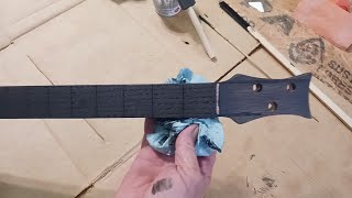 Cigar Box Guitar Staining the neck black Unconventional method [upl. by Eeleimaj]