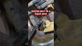 Breaking a rusted bolt loose in a tight spot automechanic [upl. by Selie]