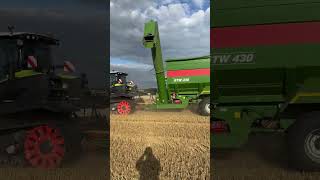 Claas Axion 960 Terra Trac with Bergmann grain cart fast lane to unload Claas Lexion 8700 Terra Trac [upl. by Amberly]