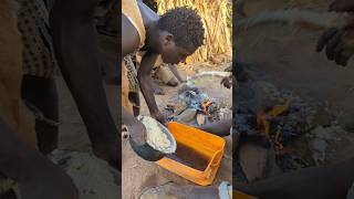 Bushmen hadzabe make cooking ugali [upl. by Nichole]