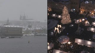 First snow covers Czech capital Prague as Christmas market opens  AFP [upl. by Alejandro39]