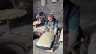 Baking the first Lavash bread in the traditional oventonir [upl. by Pincince774]