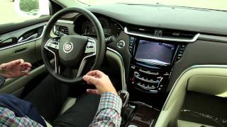 How To Use the Cadillac XTS or CTS Auto Park Assist [upl. by Orozco664]