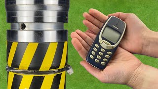 EXPERIMENT NOKIA 3310 VS HYDRAULIC PRESS [upl. by Ahsiekit]