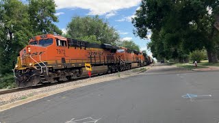 BNSF 7972 leads a grain box and tanker cars train at Atwood Street Longmont [upl. by Skyler112]