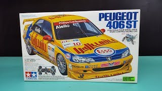 Tamiya TL01 Peugeot 406 st 110 4WD Unboxing and review 58212 [upl. by Okoyk]