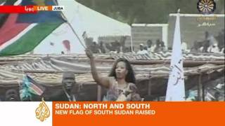 Juba crowd cheers South Sudanese flag raising [upl. by Ettennil]