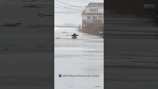 Person spotted kayaking down a flooded road in Wells Maine [upl. by Malamud]