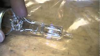 Smashing a Philips EcoVantage halogen incandescent light bulb [upl. by Assenab502]