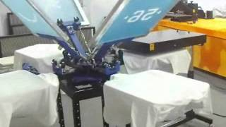 4 color 4 station screen printing tshirt printing machine working video 006026 [upl. by Kcirdehs505]