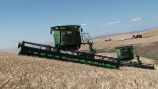 John Deere STS combines equipped with Hillco Hillside Leveling Systems [upl. by Pazice]