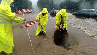 Emergency Drain Unclogging Clearing Flooded Streets After Heavy Rain [upl. by Olrac482]