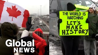 Trucker convoy People line bridges in Greater Toronto Area as trucks roll through [upl. by Akinam]