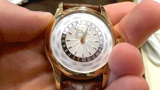 Patek Philippe World Time Explained [upl. by Iveksarap]