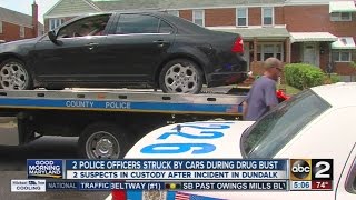 2 officers hit by cars in Dundalk during drug bust [upl. by Nyrek]