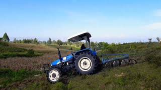 New Holland Tractors TT55 4WD  Bajak Cangkul 3x24quot [upl. by Yrekaz]