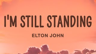 Elton John  Im Still Standing Lyrics [upl. by Aitnic]