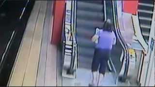 Motorized Scooter Gets Owned By the Escalator 071312 [upl. by Nivan923]