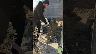 Completing a Blue Stone retaining wall canberra stonemason masonry landscaping [upl. by Isyad]