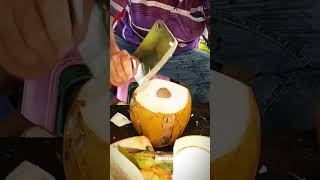 Big golden coconut cutting on the street trending fruit [upl. by Nebuer59]