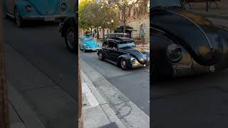 Lots of Volkswagen Beetles parade on the street [upl. by Nimrahc]