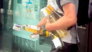 Riot thugs loot booze from Sainsburys in Manchester  SWNS [upl. by Nedearb]