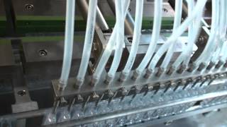 Plastic ampoules filling and sealing machine [upl. by Cheyney]