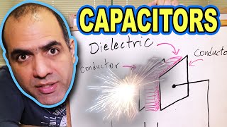 How CAPACITORS Work ElectroBOOM101006 [upl. by Enenaej]