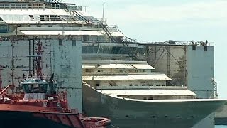 Costa Concordia wreck docks in Genoa [upl. by Chemash]