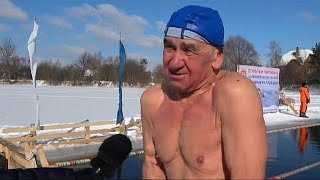 Russian ice swimmers brave 10C temperatures [upl. by Mcmath]