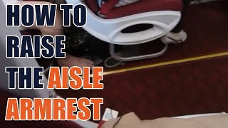 How to Raise the Aisle Armrest on a Plane [upl. by Shaia640]