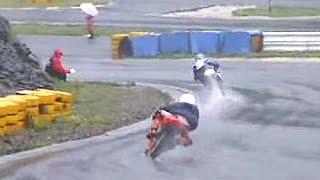 Mini bike race on the wet road [upl. by Labotsirc]