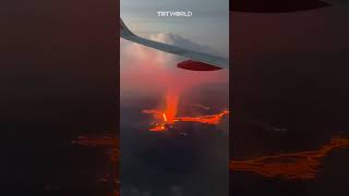 Passenger captures footage of Iceland volcano eruption during flight [upl. by Yssej]