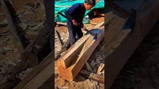 Old carpenter cutting a large beam with a longhandled axe [upl. by Det]